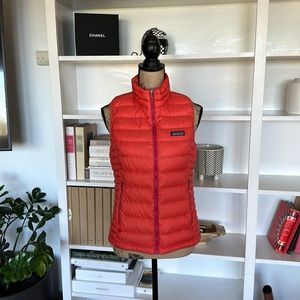 Patagonia women’s small down vest orange and magenta.